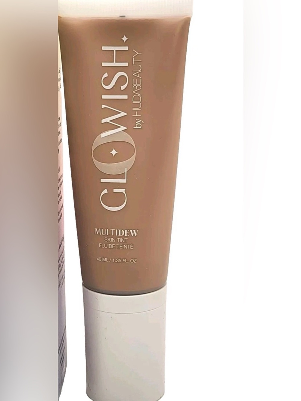 Huda glowish Multidew Skin Tint - tan light shade 07 never opened